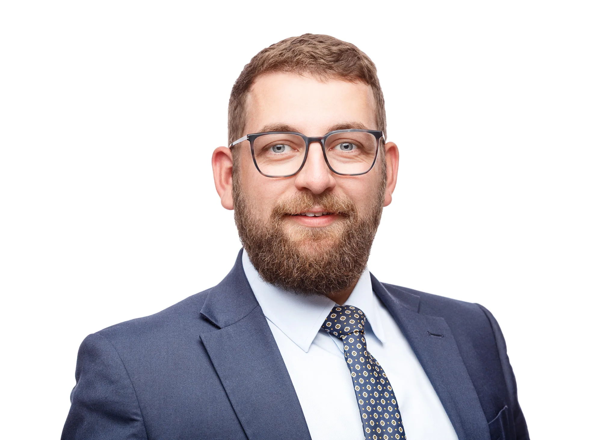 Professional man with beard wearing glasses and business suit