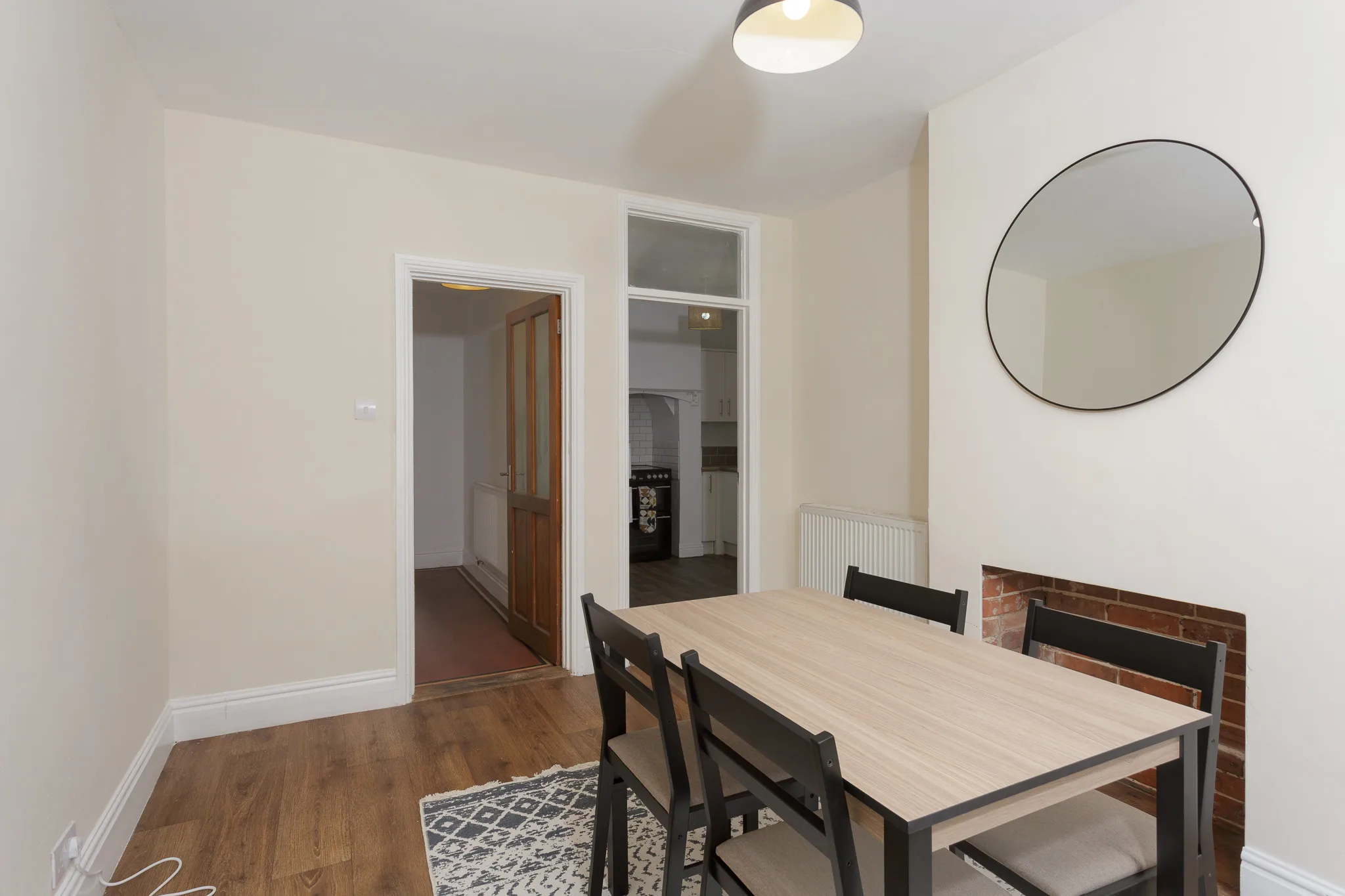 Dining room of a Suffolk holiday let prepared and cleared before photography