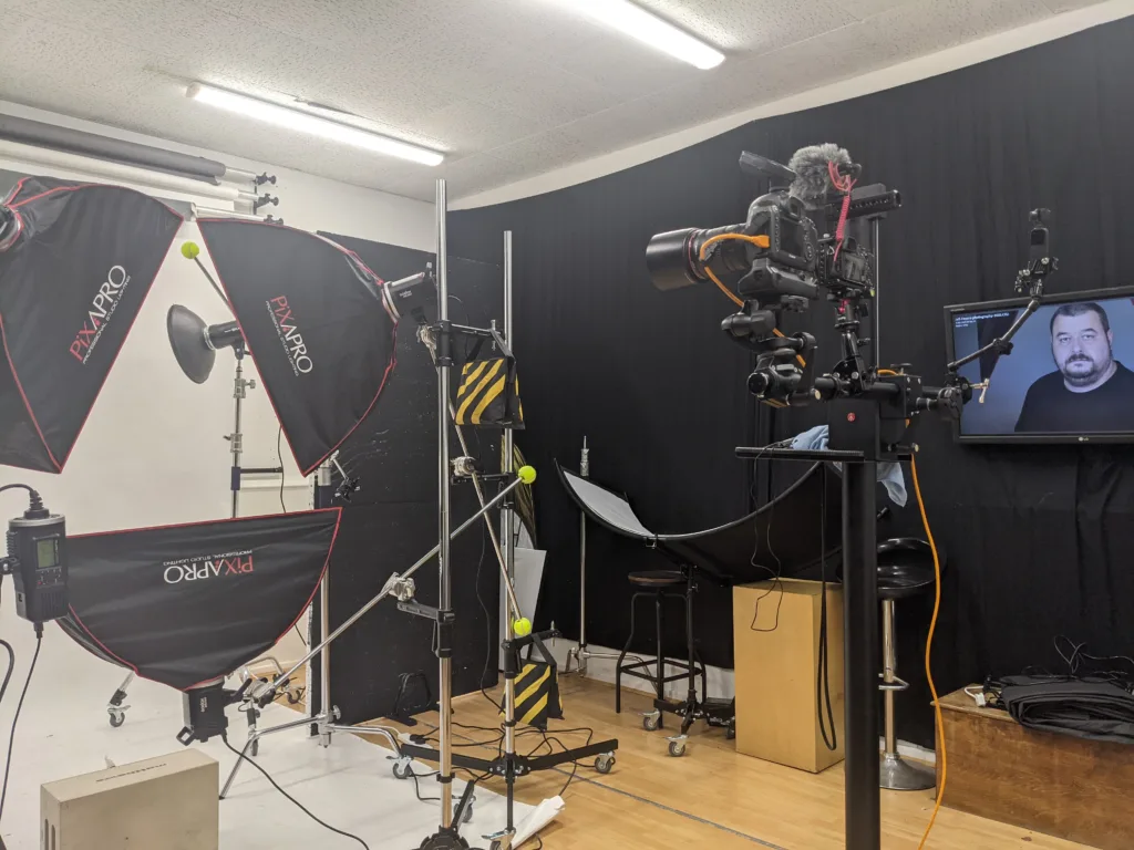 Inside the Foyers Photography studio at Bentwaters, with softboxes, a camera on a studio stand and a screen for reviewing images during the session